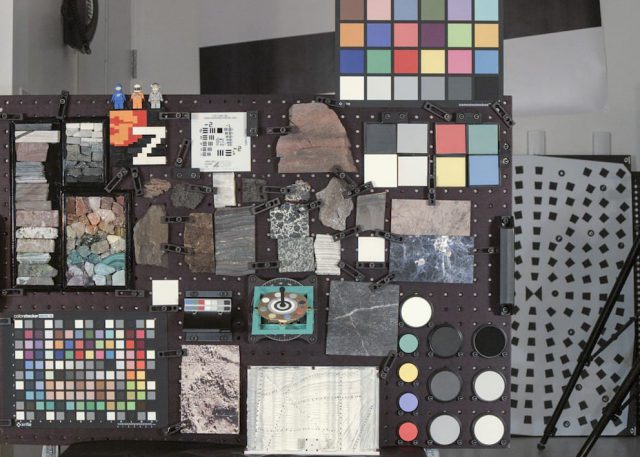 A wide-angle RGB photo of the "GeoBoard" (color calibration targets, geometric calibration targets, and natural geologic samples with lots of color and texture, all designed to put the color and resolution capabilities of the cameras to the test) taken by the Mastcam-Z flight left camera at the 34 mm zoom setting. This target is about as far away from the cameras as typical outcrop rocks might be on Mars, giving an idea of the image quality and field of view that will be available.